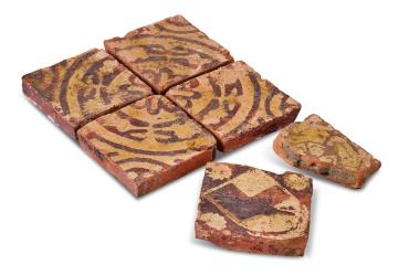 Medieval encaustic floor tiles depicting crests of the Woodville family and the House of York