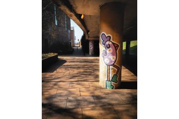 Painting of the Binty Chicken on underpass pillar in Northampton
