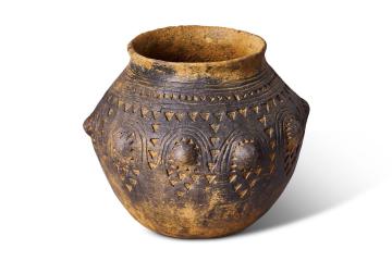 Anglo-Saxon pottery vessel excavated from cemetery at Overstone Leys. 