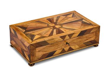 Wooden box made from differently woods of Jamaican trees and presented in 1838 to William Knibb