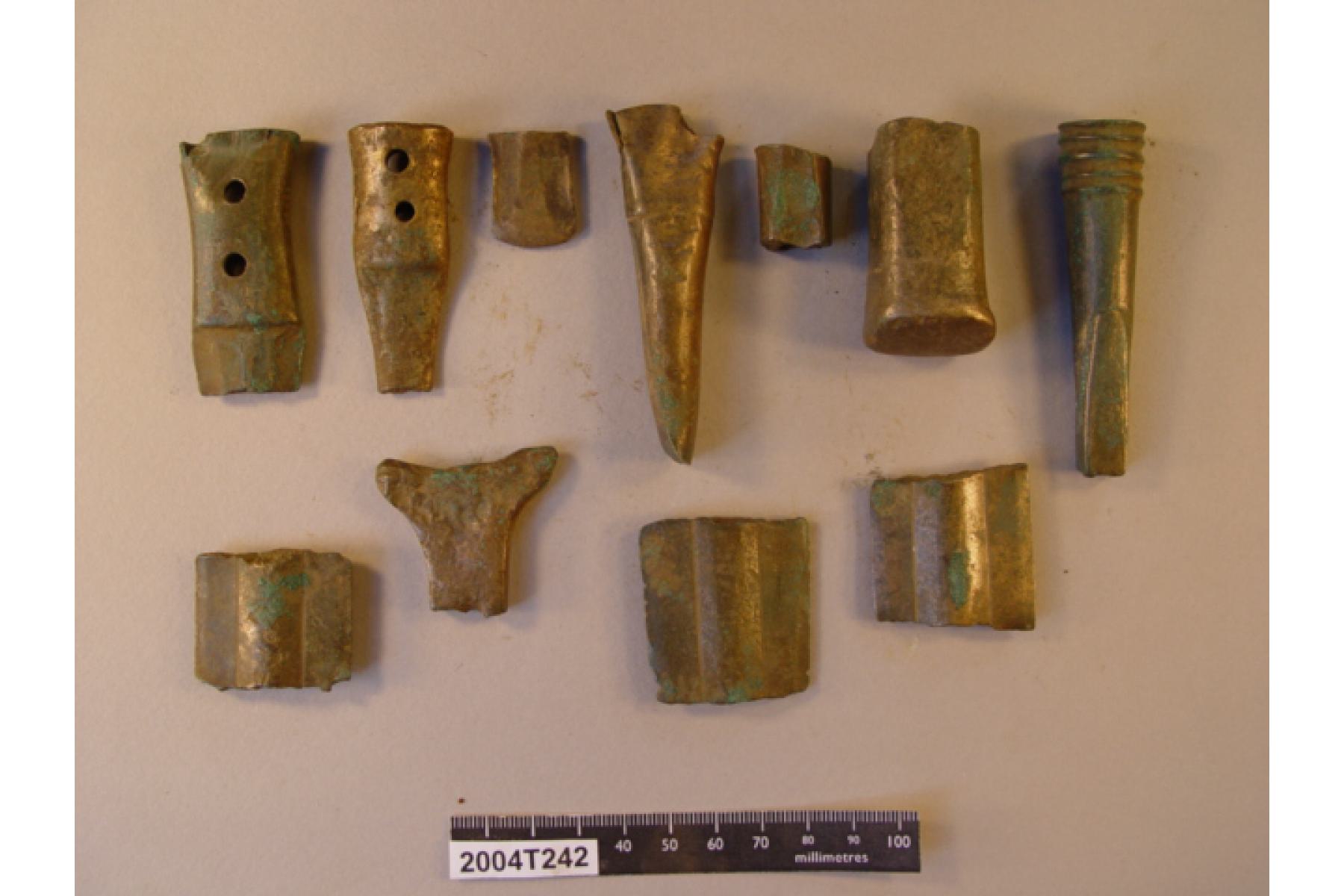 Number of additional bronze metal fragments included blade fragments