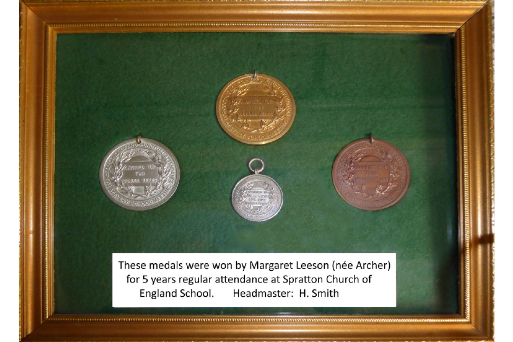 4 Spratton School Attendance medals in wooden frame