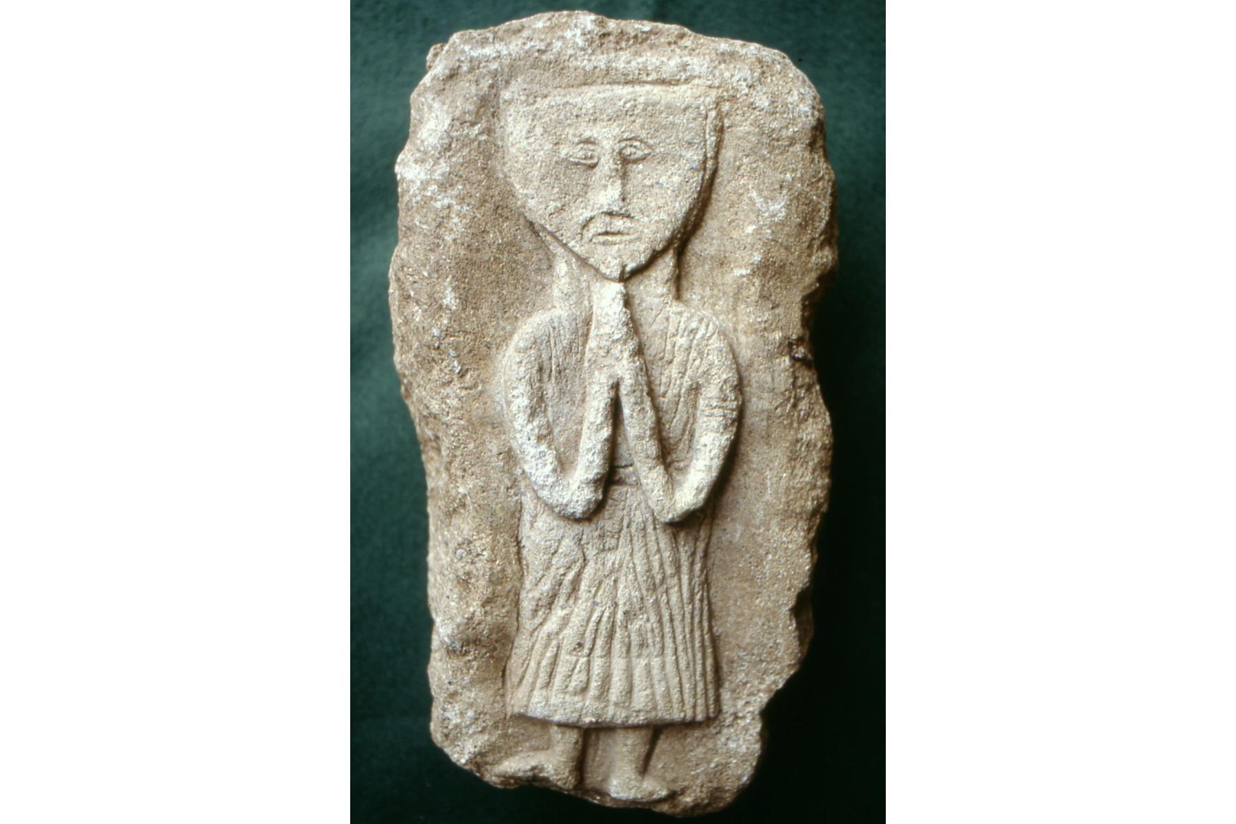 Carved stone figure mid-13th century