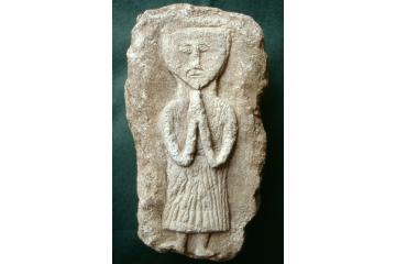Carved stone figure mid-13th century