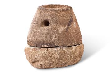 Iron Age quern stones - top and bottom stones from Hunsbury Hillfort