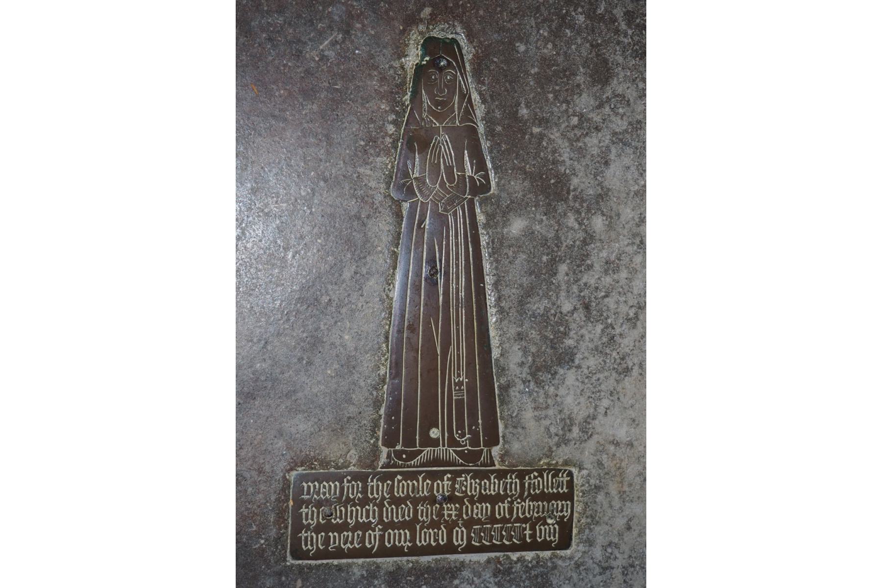 brass of grave in Collyeston church