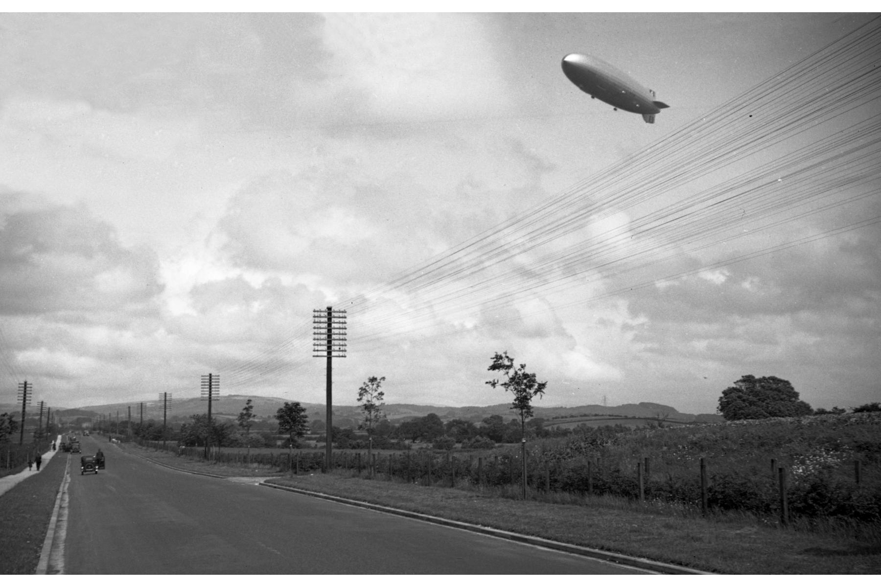 A German Zeppelin over outskirts of Edinburgh, Scotand during WW I