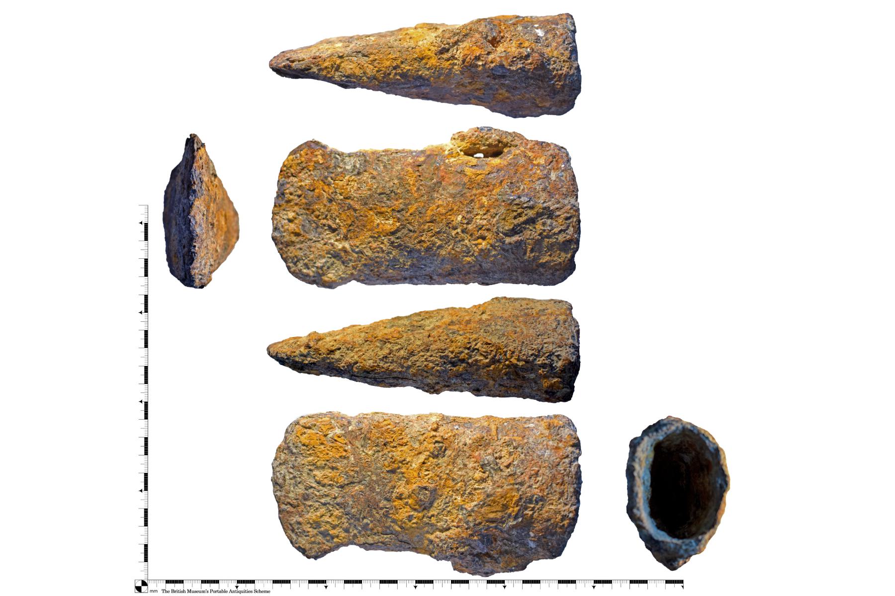 Wrought iron socketed axe head - view of all sides showing hollow socket