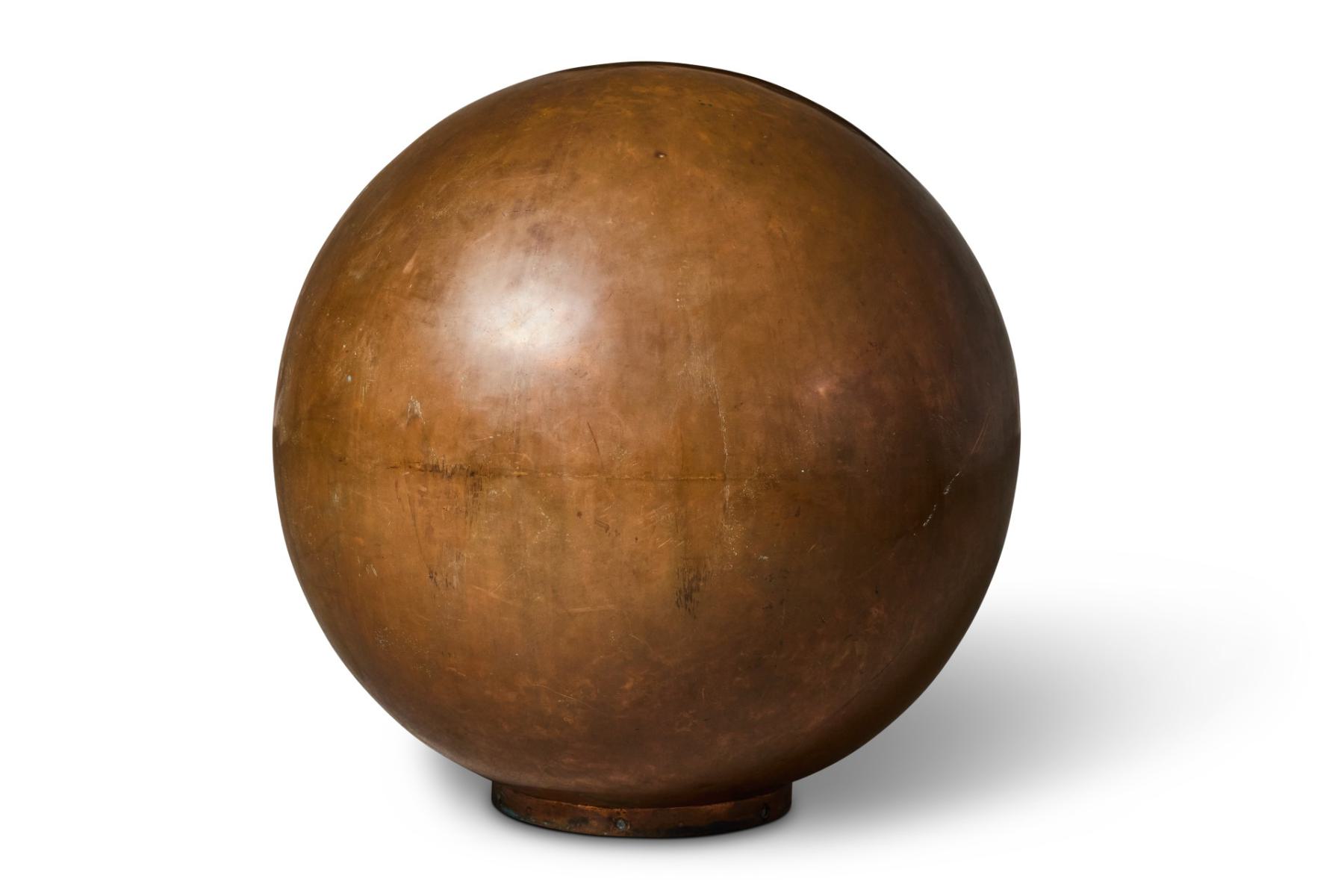 Large copper ball added to the cast iron Victorian Market Square fountain in Northampton in 1954.
