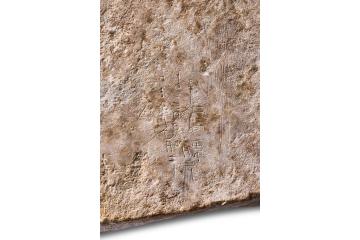 Roman stone tile with inscribed symbols