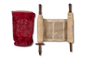 Torah Scroll and red velvet bag.