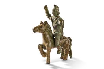 Solid Roman bronze horse and rider statuette, possibly a votive offering.